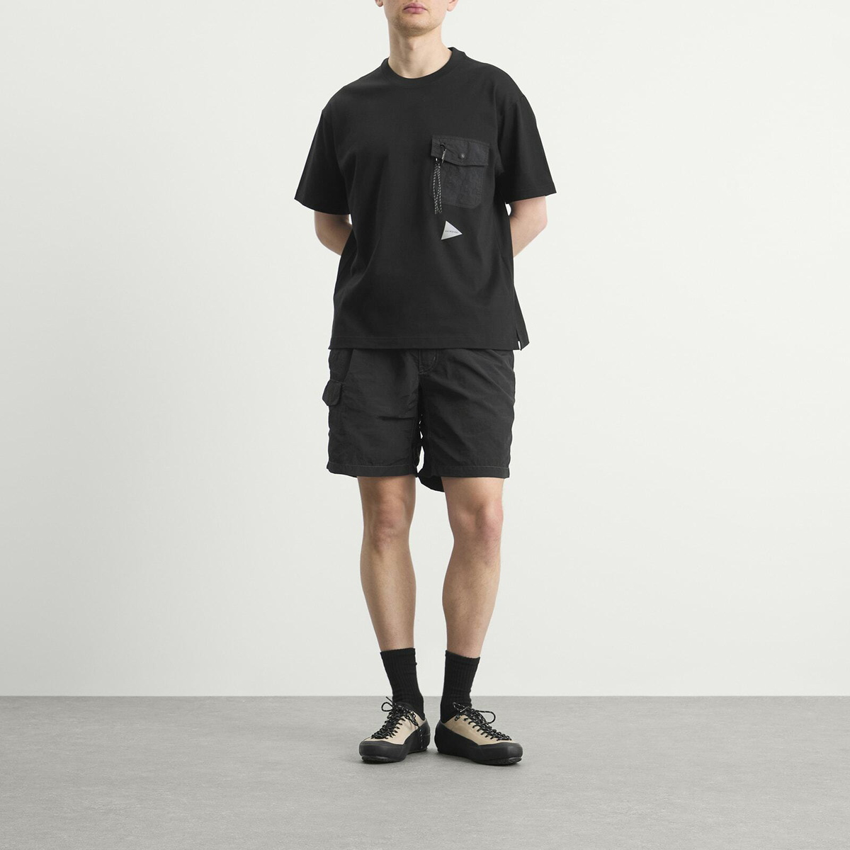 And Wander Men's Pocket T-Shirt in Black