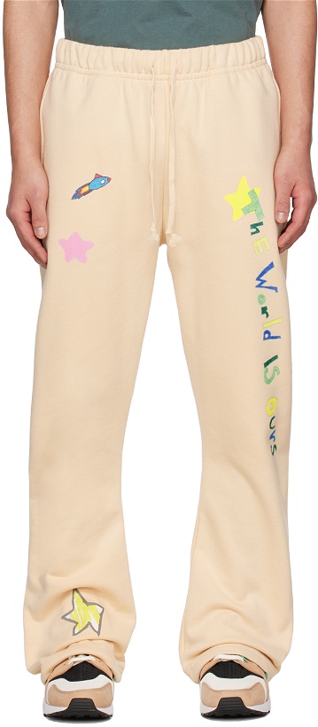 Photo: Kids Worldwide SSENSE Exclusive Beige 'The World Is Ours' Lounge Pants