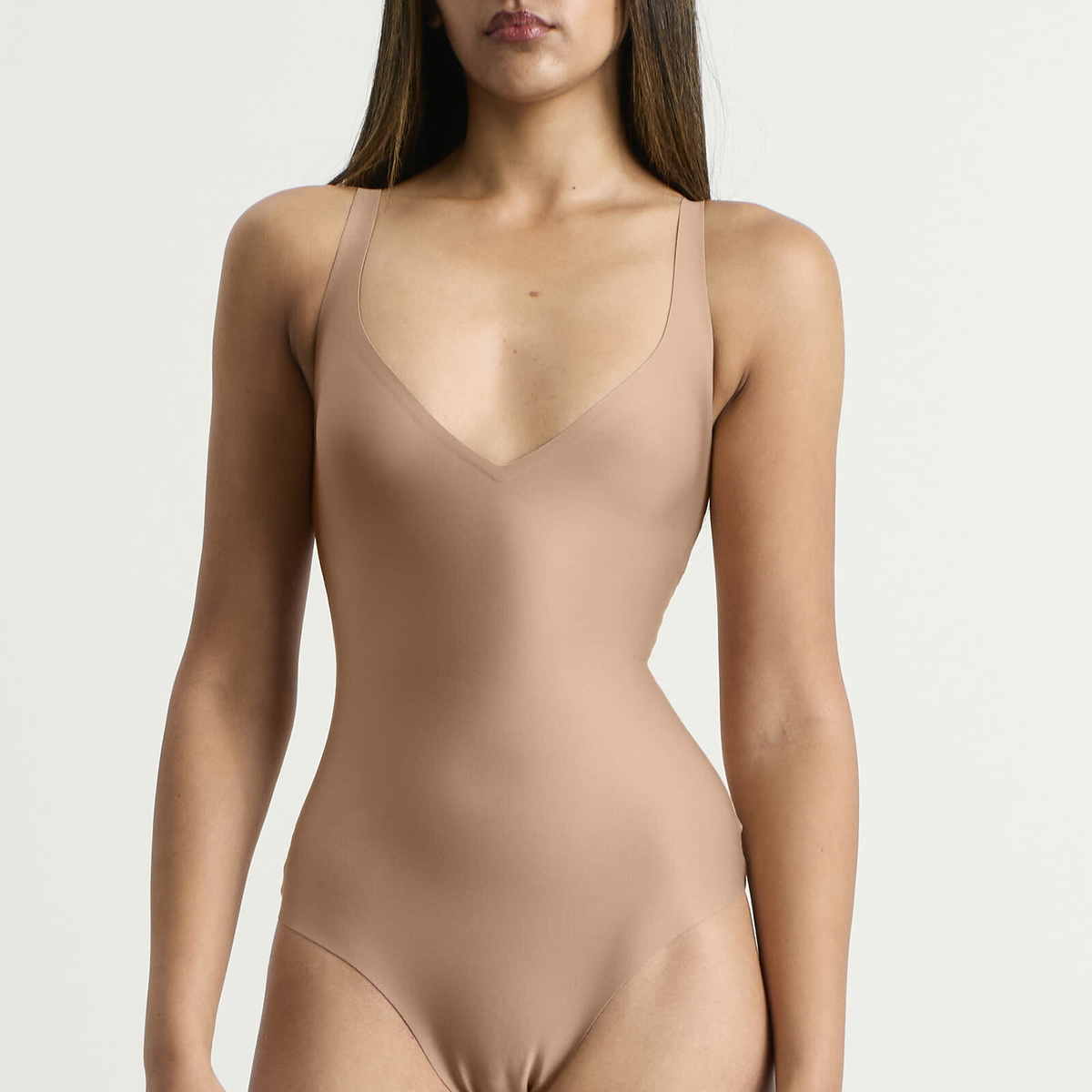SKIMS Women's Unlined Plunge Thong Bodysuit in Sienna