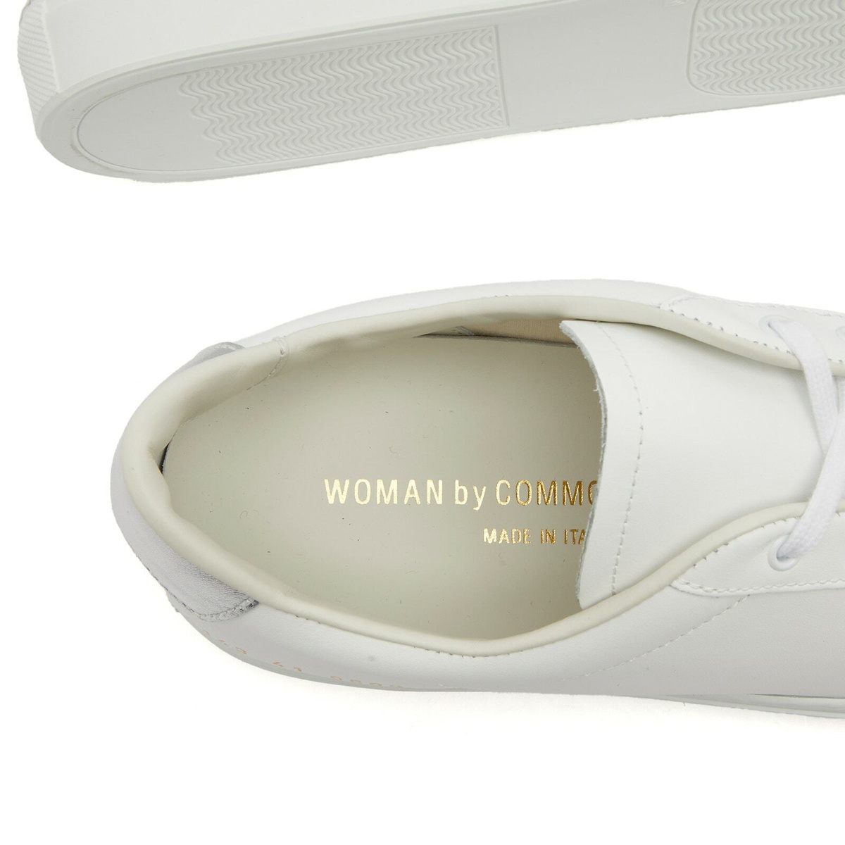 Woman by Common Projects Women's Retro Classic Trainers Sneakers in White/Silver