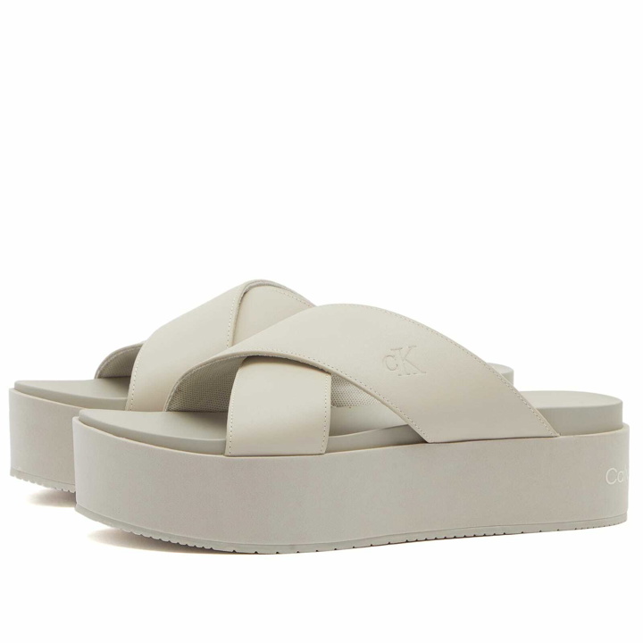 Photo: Calvin Klein Women's Crossover Flatform Slider in Triple Eggshell