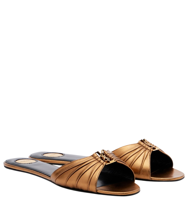 Photo: Saint Laurent Babylone metallic leather slides