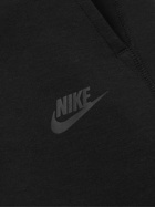 Nike - Tapered Logo-Print Cotton-Blend Tech Fleece Sweatpants - Black