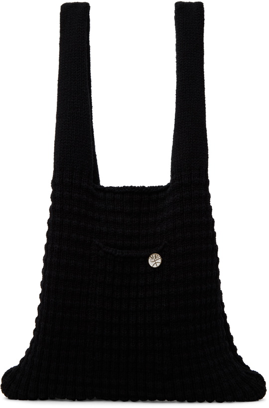 Photo: XENIA TELUNTS Black Pocket Tote
