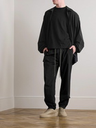 FEAR OF GOD ESSENTIALS - Tapered Logo-Appliquéd Shell Sweatpants - Black