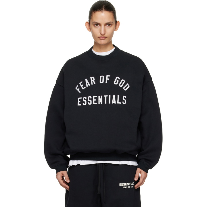 Photo: Fear of God ESSENTIALS Black Varsity Crewneck Sweatshirt