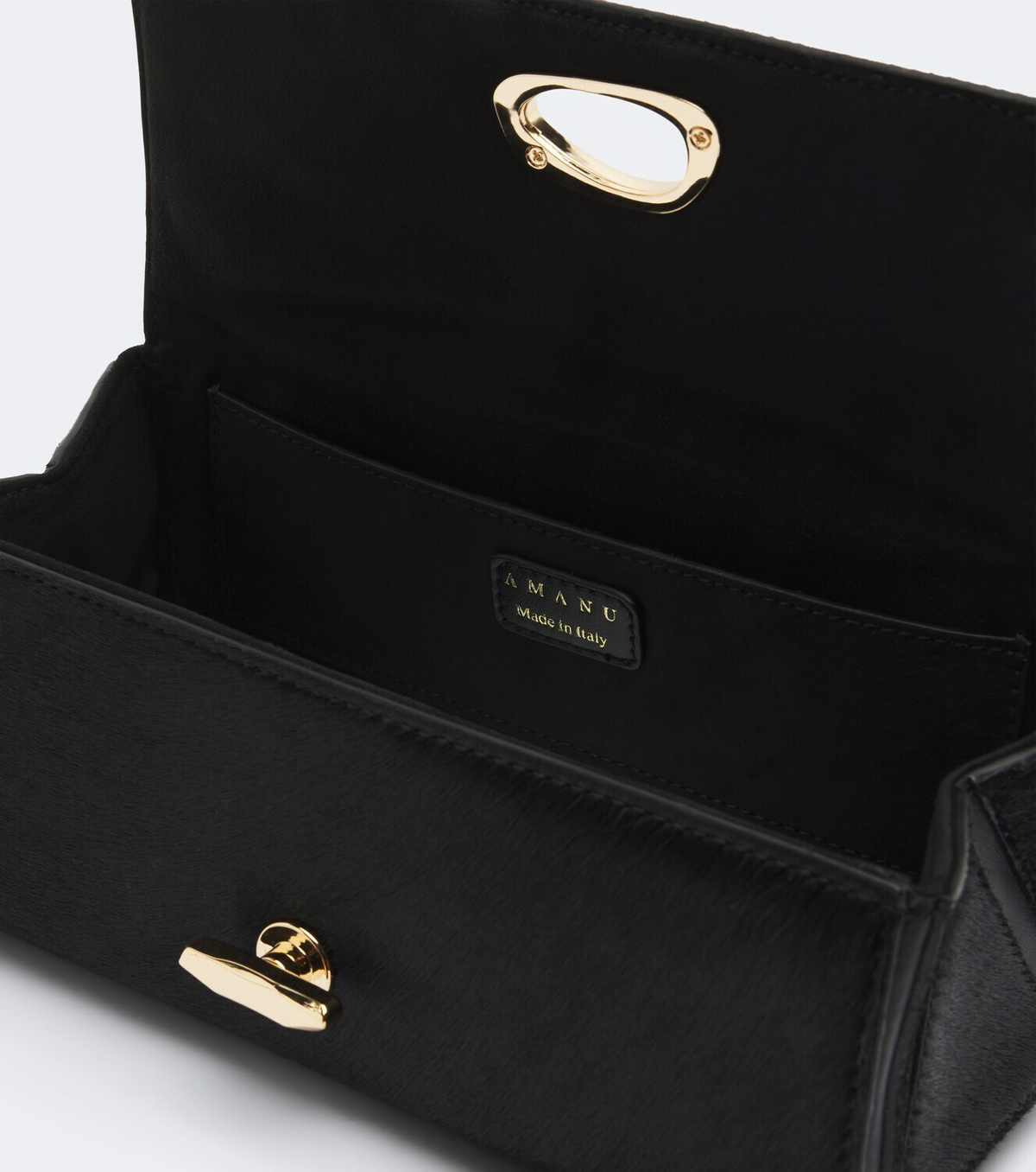 Amanu Tanzania calf hair clutch