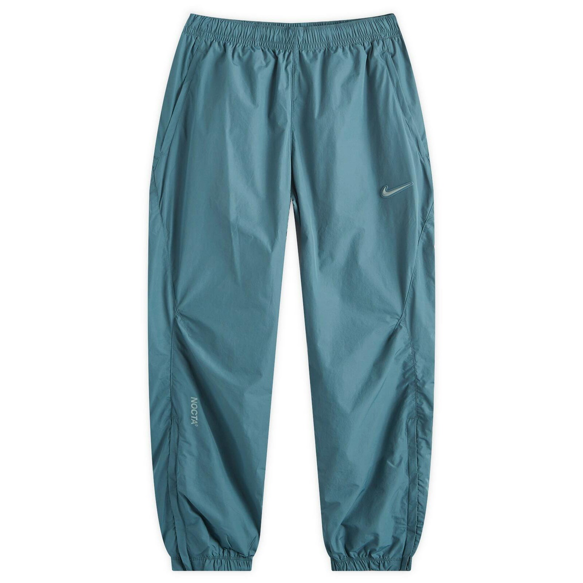 Nike Nocta Cardinal Stock Woven Track Pant in Mineral Slate Nike Nocta Cardinal Stock Woven Track Pant in Mineral Slate