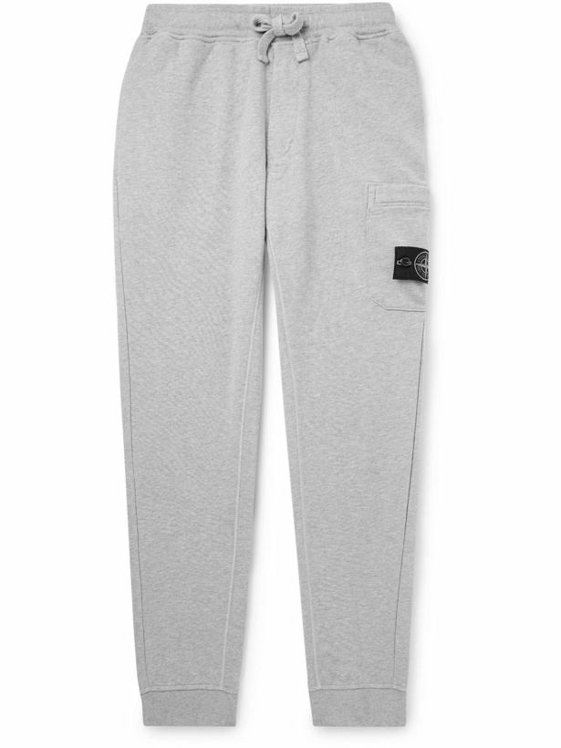 Photo: Stone Island - Tapered Logo-Appliquéd Cotton-Jersey Sweatpants - Gray