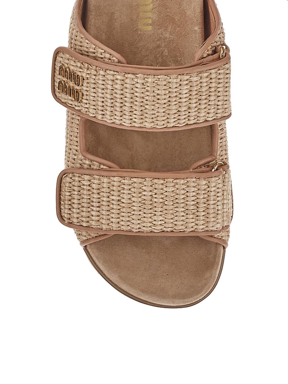 サンダル・ミュール MIU MIU LOGO RUCHES SANDALS Miu Miu Matelassé logo-plaque Sandals | Neutrals | FARFETCH