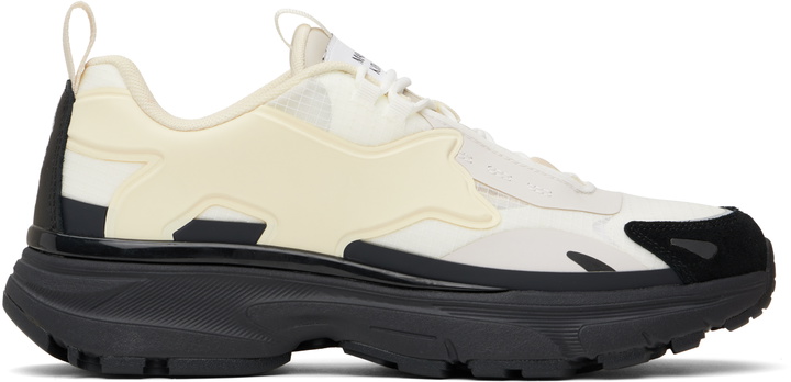 Photo: Maison Kitsuné Off-White & Black Sora Sneakers