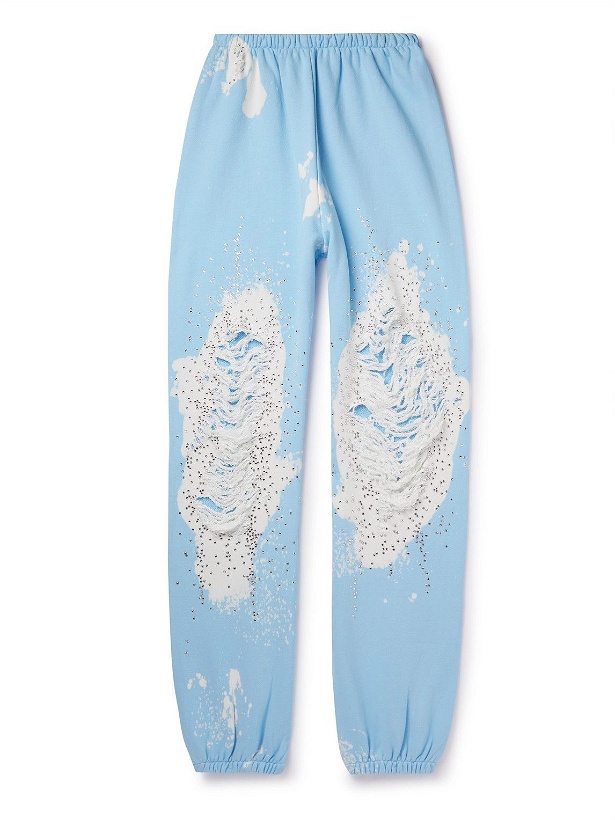 Photo: Liberal Youth Ministry - Tapered Crystal-Embellished Distressed Cotton-Jersey Sweatpants - Blue