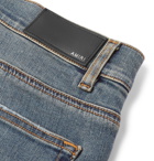 AMIRI - Thrasher Skinny-Fit Distressed Stretch-Denim Jeans - Men - Light blue