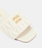 Miu Miu Logo matelassé leather slides