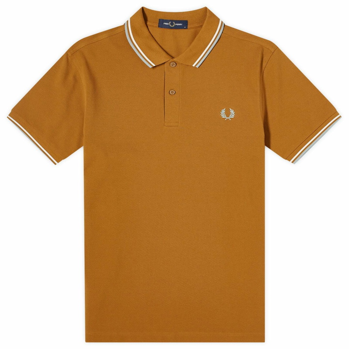 Photo: Fred Perry Men's Twin Tipped Polo Shirt in Dark Caramel/Snow White/Silver Blue