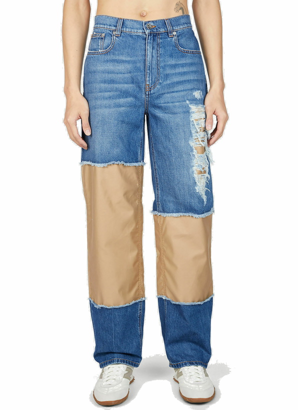 Photo: JW Anderson - Distressed Patches Jeans in Blue