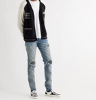 AMIRI - MX1 Skinny-Fit Panelled Distressed Stretch-Denim Jeans - Blue