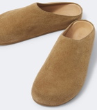 Studio Nicholson Wearing suede mules