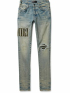 AMIRI - Skinny-Fit Leather-Trimmed Distressed Jeans - Blue