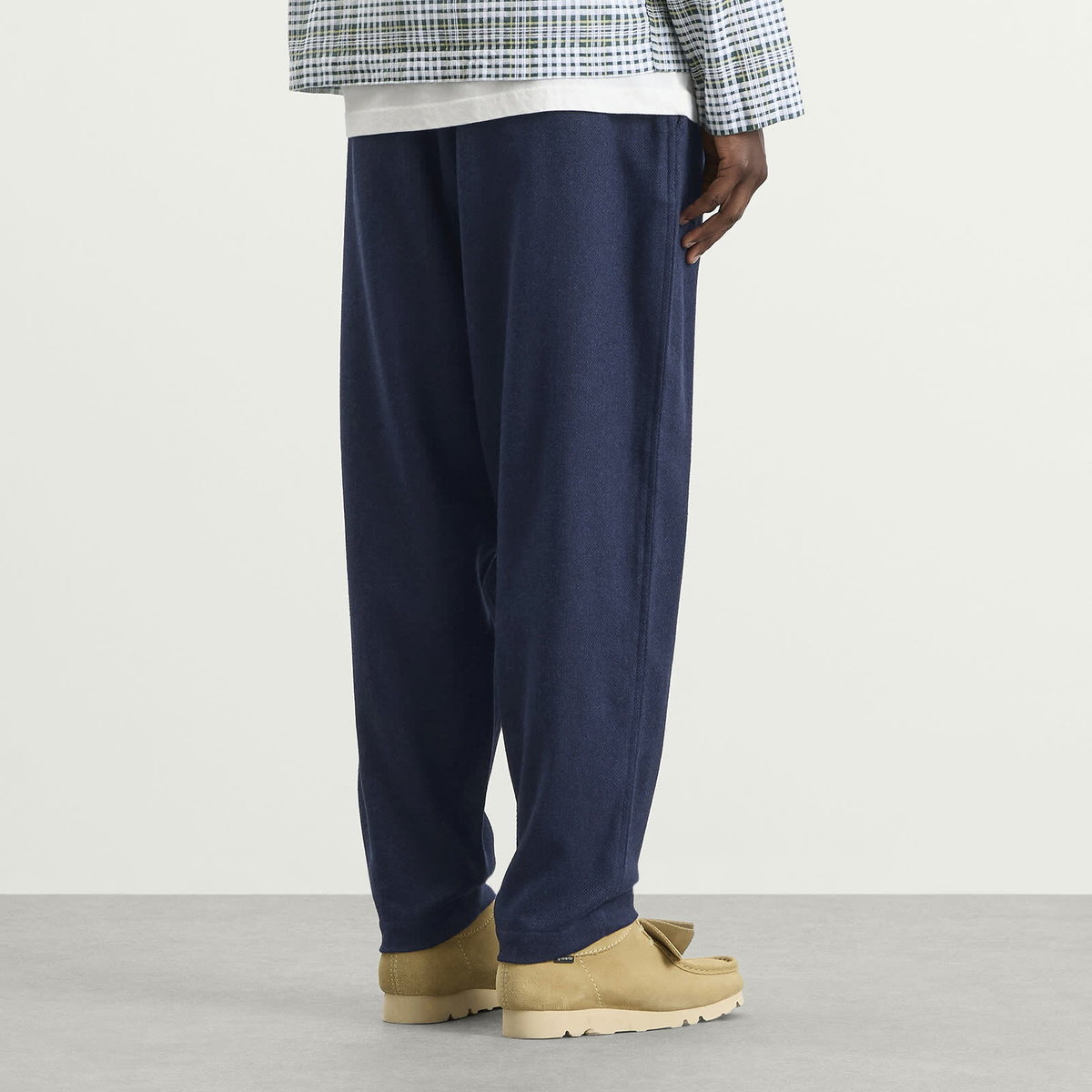Universal Works Men's Wool Herringbone Pleated Track Pant in Navy