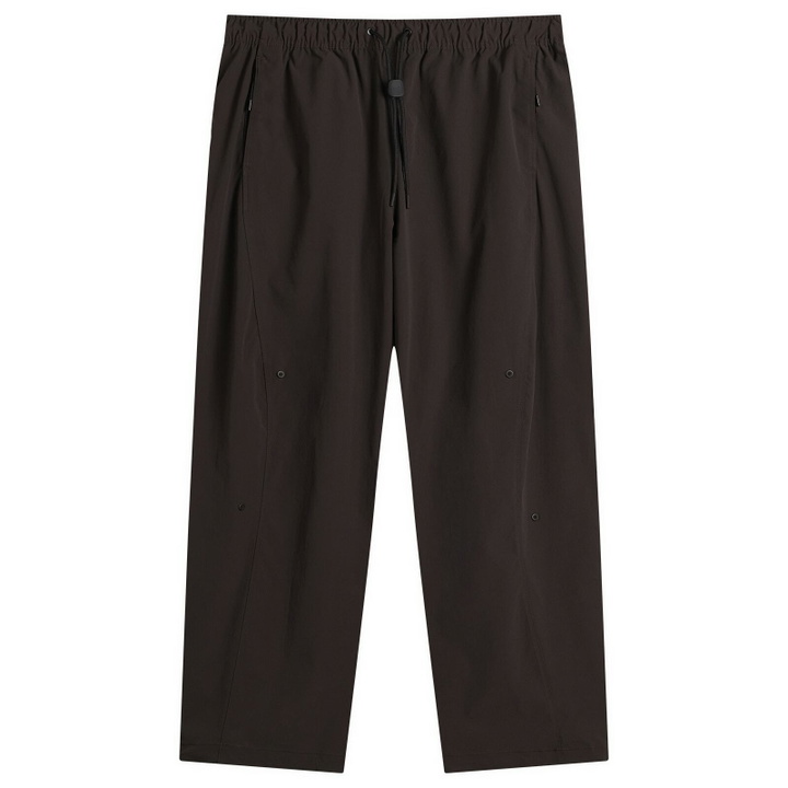 Photo: Nike Men's Tech Helios Sun Pant in Velvet Brown/Black