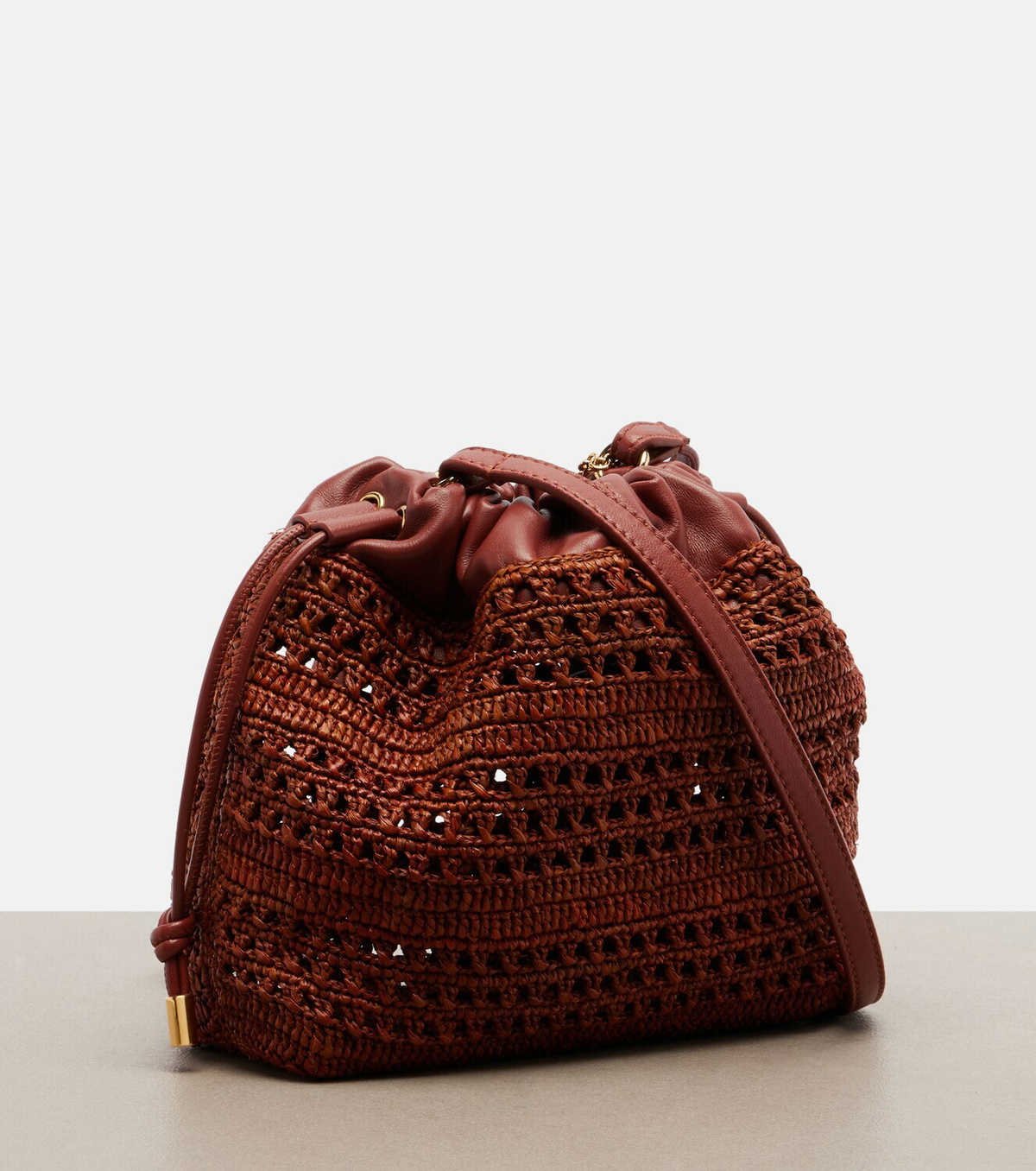 Chloé Mini leather-trimmed raffia bucket bag