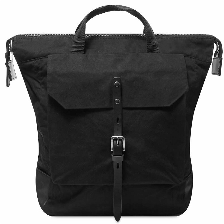 Photo: Ally Capellino Frances Waxed Cotton Rucksack in Black
