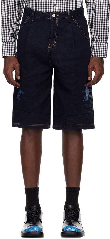 Photo: ADER error Navy Distressed Shorts