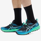 Asics GEL-TRABUCO 12 Sneakers in Black/Bright Cyan