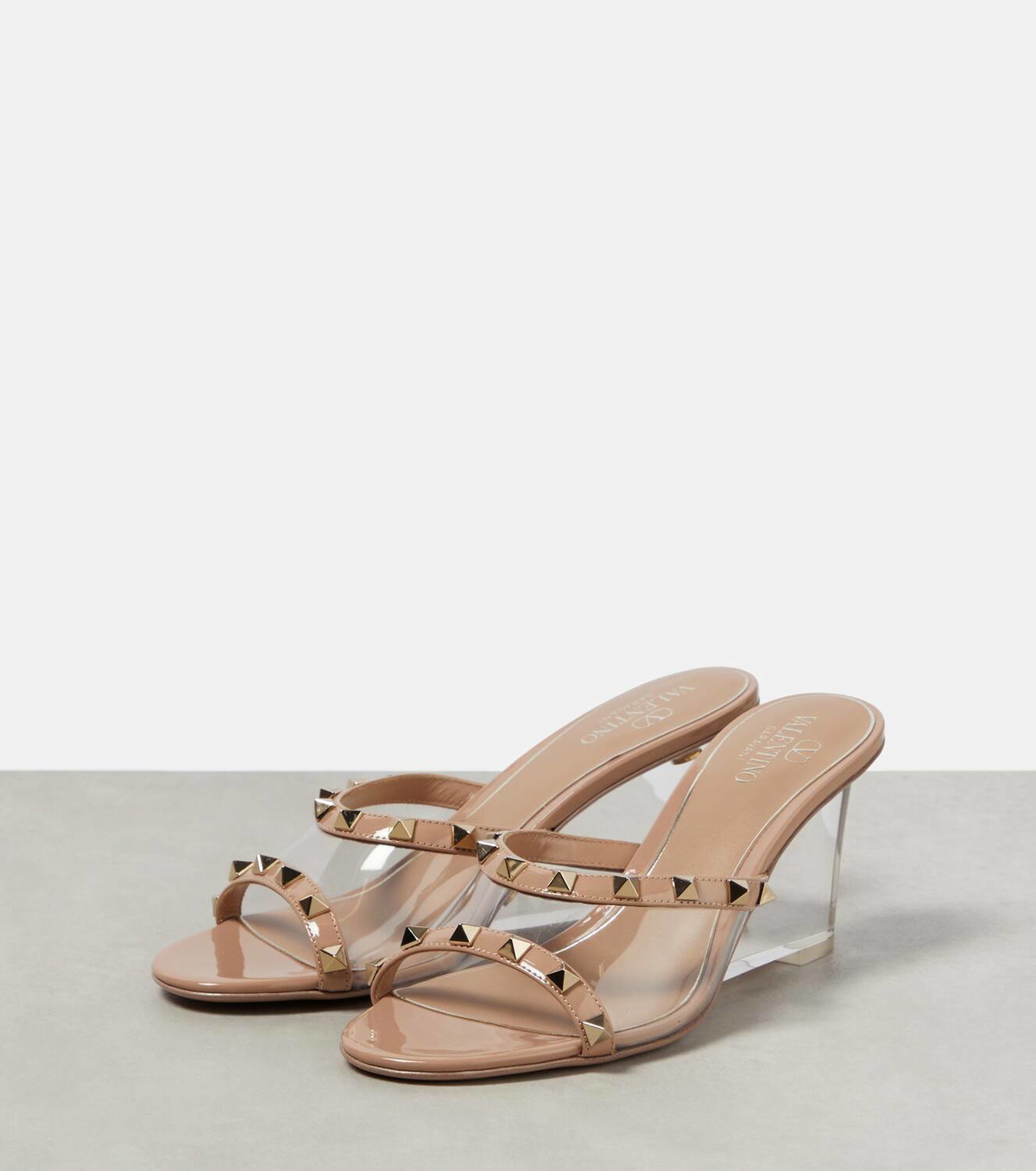 Valentino Garavani Rockstud leather and PVC wedge mules