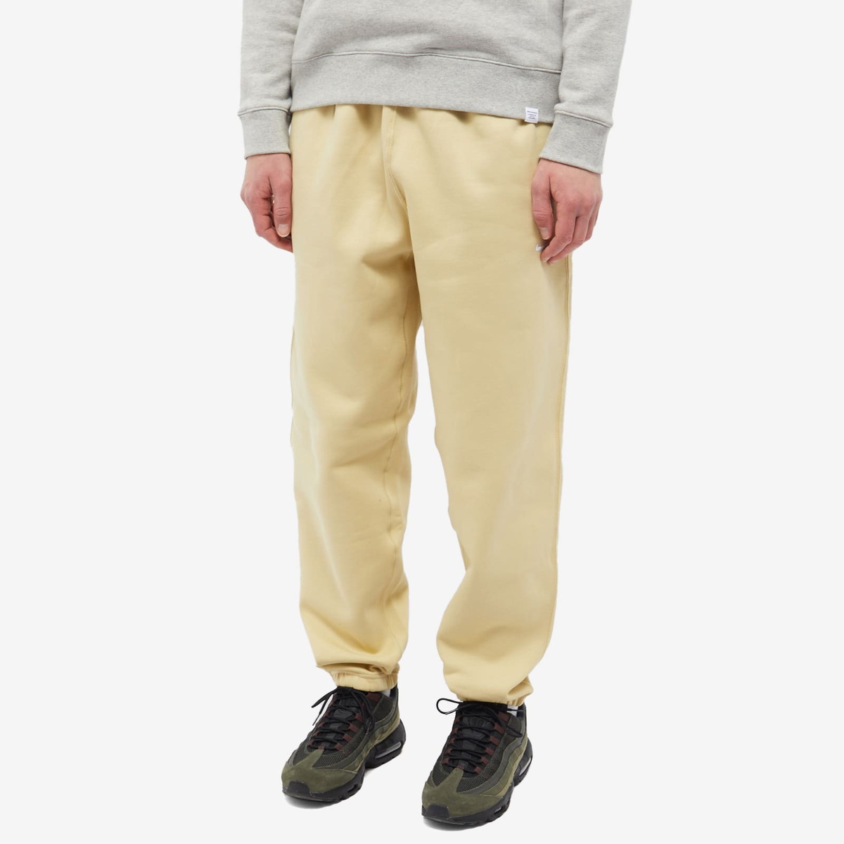 Order NIKE Solo Swoosh Fleece Pant team gold/white Pants from