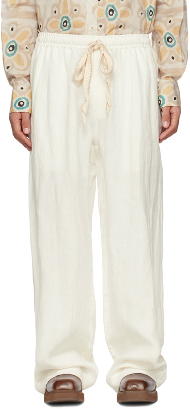 Photo: COMMAS Off-White Wide-Leg Trousers