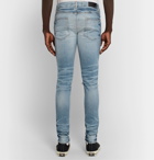AMIRI - Skinny-Fit Embellished Twill-Panelled Distressed Stretch-Denim Jeans - Blue
