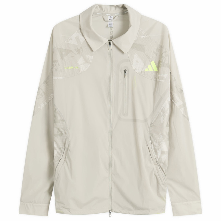 Photo: Adidas Running Men's adidas x Labrum Coach Jacket in Sesame Yellow