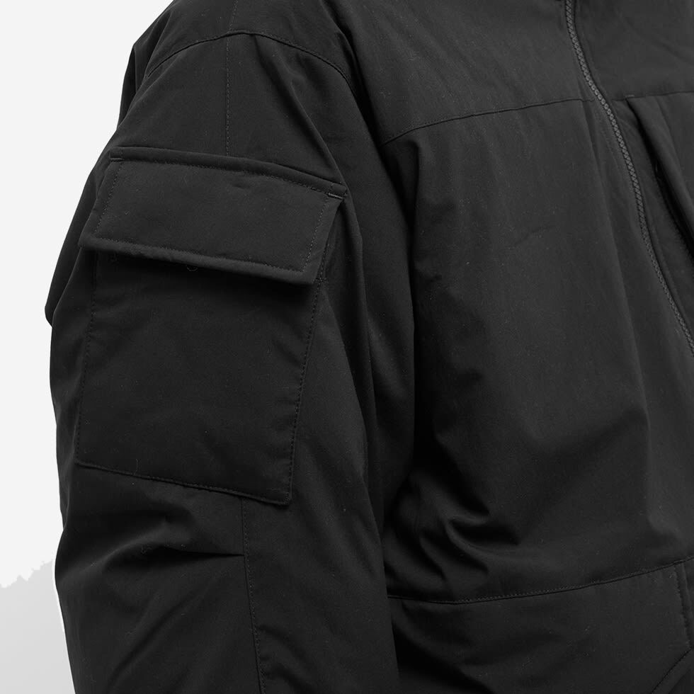 DAIWA Men's Tech Padding Mil Jacket in Black DAIWA