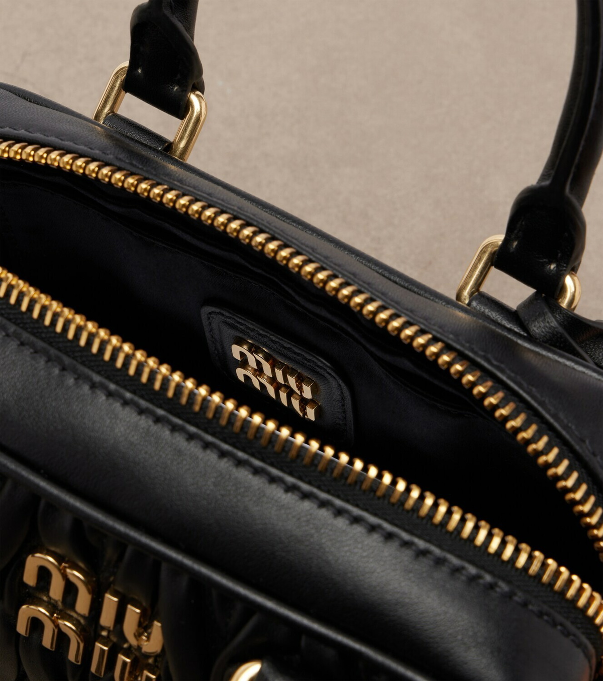Miu Miu Arcadie matelassé leather top-handle bag