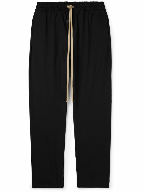 Photo: Fear of God - Tapered Logo-Appliquéd Shell Sweatpants - Black
