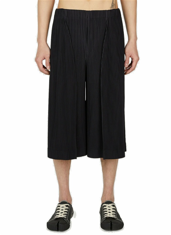 Photo: Homme Plissé Issey Miyake - Cropped Wide Leg Pants in Brown