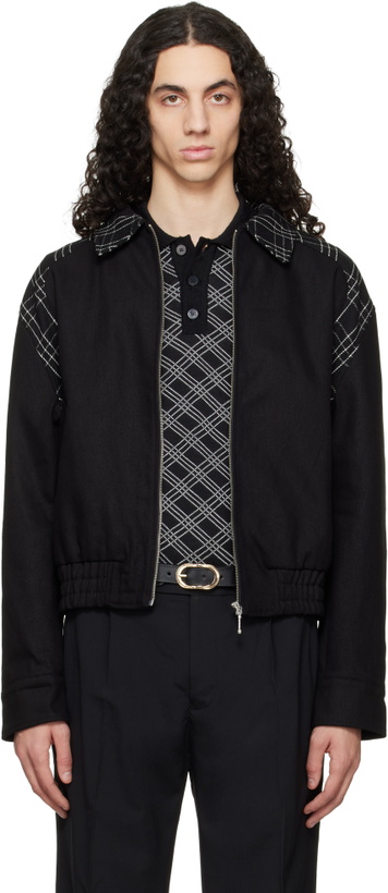 Photo: Ernest W. Baker Black Varsity Jacket