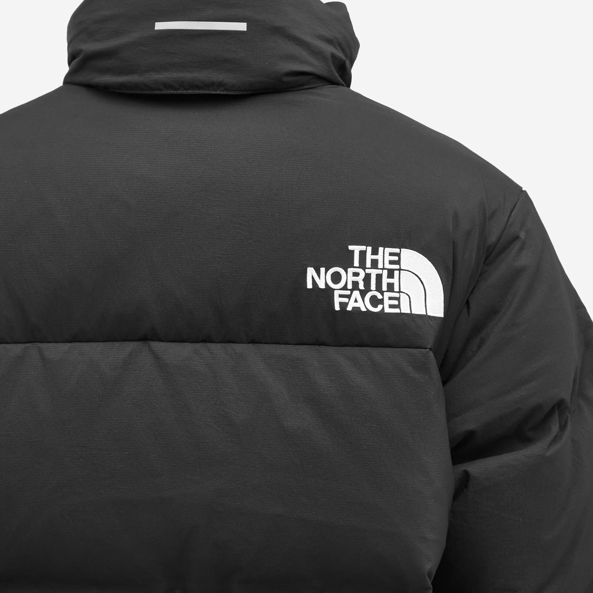 The North Face Women's Rmst Nuptse Convertible Jacket in Black The ...