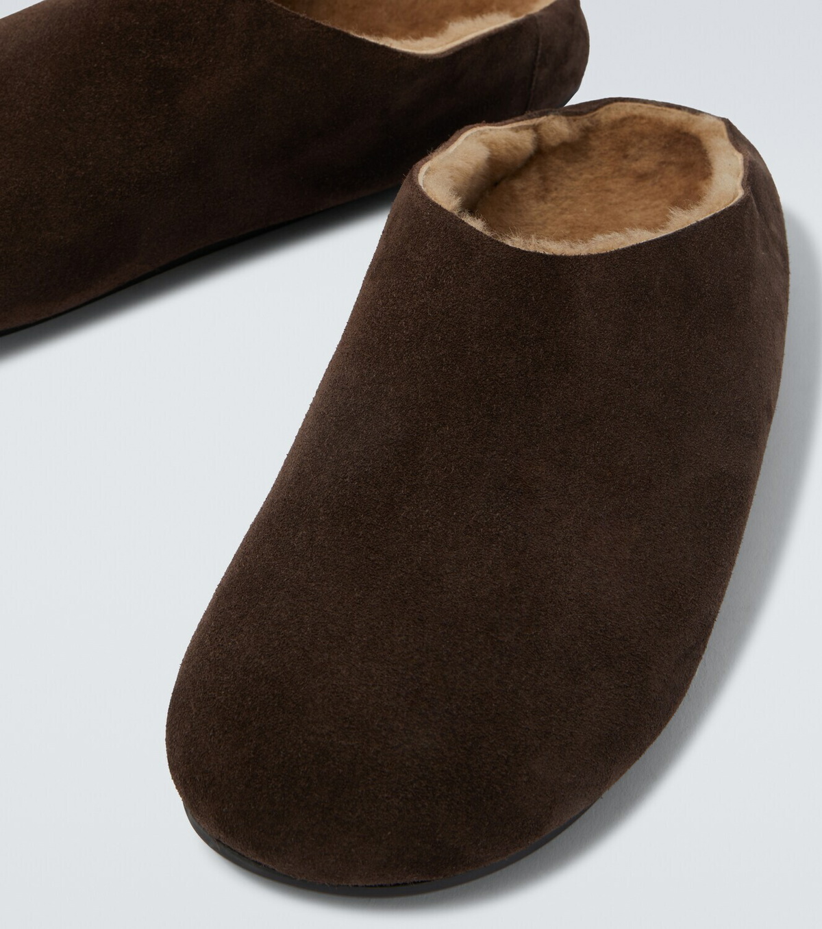 The Row Hudson shearling-lined suede mules