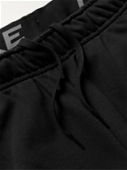 NIKE TRAINING - Tapered Dri-Fit Loopback Cotton-Blend Jersey Sweatpants - Black
