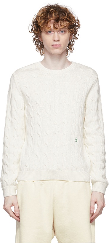 Photo: Sporty & Rich Off-White Cable Knit Crewneck Sweater