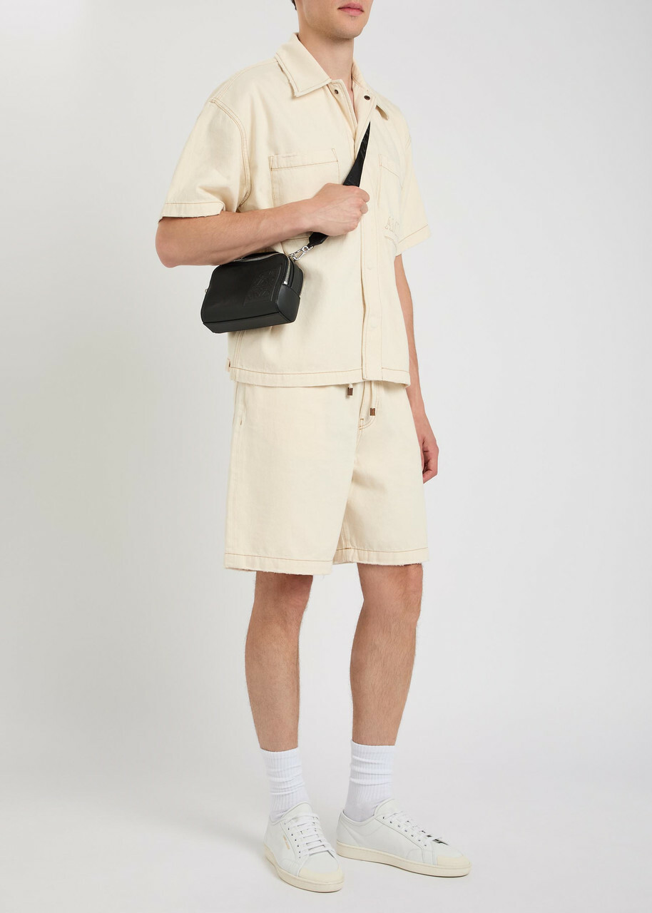 Amiri Logo-embossed Distressed Denim Shorts Ecru