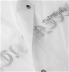 Vetements - Logo-Print Rubber Raincoat - Neutrals
