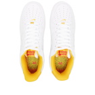 Nike Air Force 1 Low Retro QS Sneakers in White/Gold
