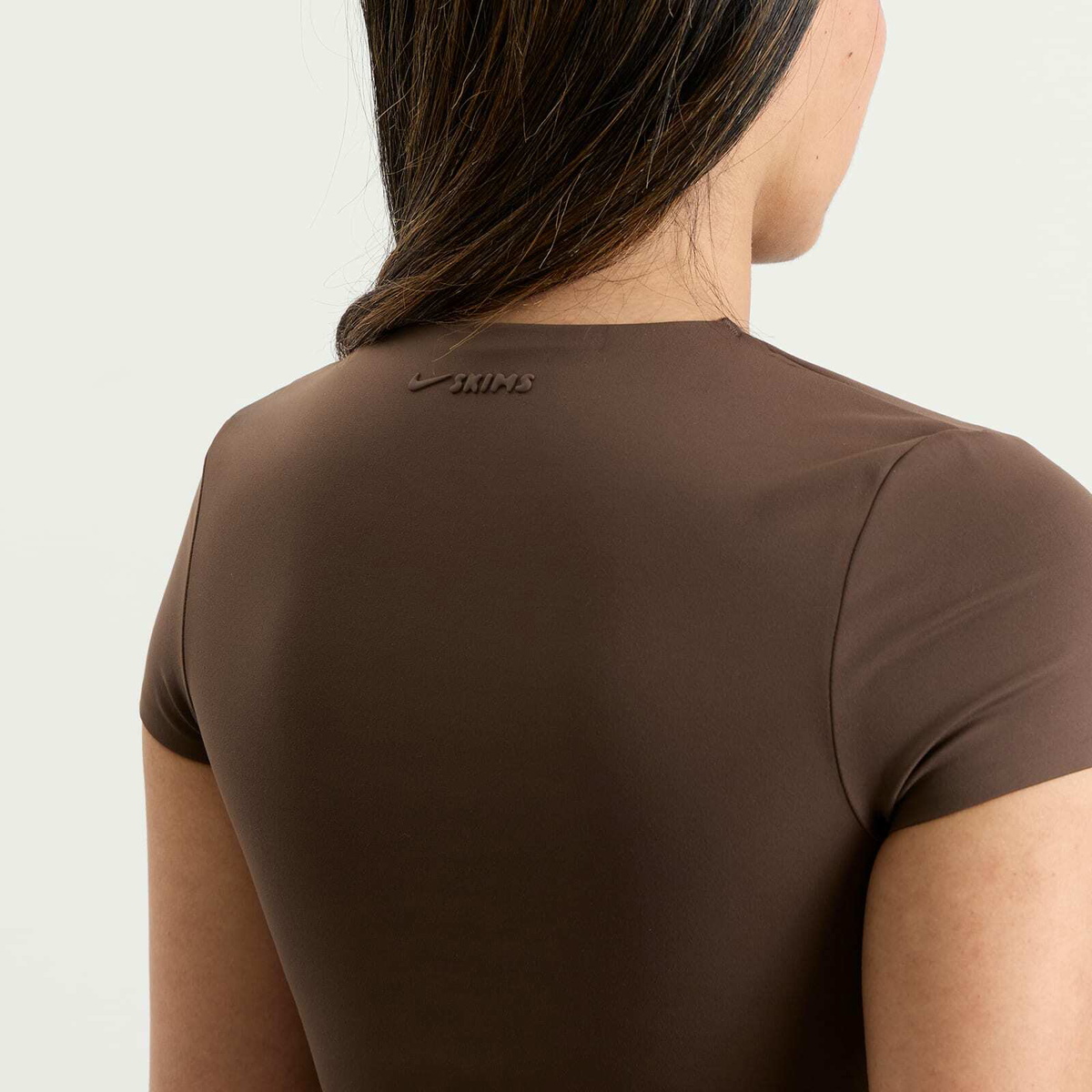 Nike Women's x SKIMS Matte Corset Short Sleeve Crop Top in Dark Sepia