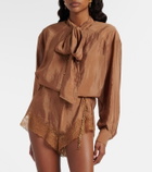 Saint Laurent Lace-trimmed tie-neck romper