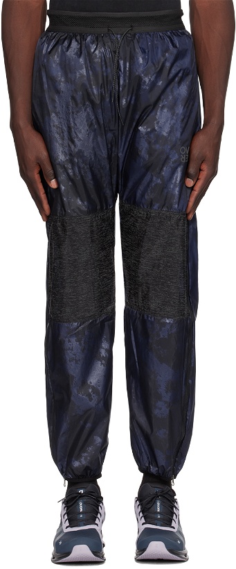 Photo: OVER OVER Navy Paneled Track Pants