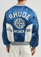 Rhude Chamonix Ski Souvenir Satin Bomber Jacket Blue And White